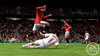 PS3_ManUxBMun_Rooney+Demichelis_Slide-Tackle