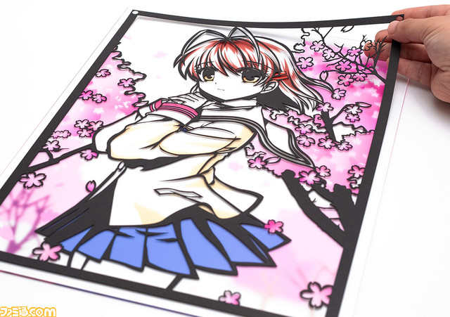 『クラナド』より古河渚の切り絵が10月28日より通販サイト“キリトリエ”にて予約開始。桜の舞い散る坂道をバックに細部まで紙で表現