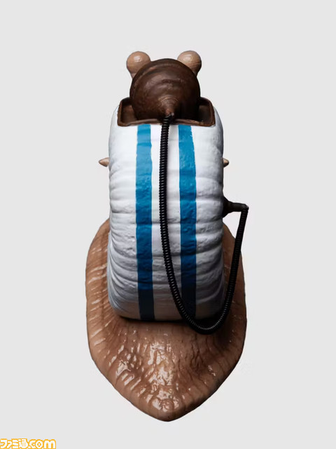 実写版『ONE PIECE』のリアルな電伝虫が貯金箱に。ヌメっとした皮膚の質感や、殻に埋め込まれたダイヤルを精巧に再現